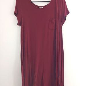 Swing burgundy dress with pocket detail